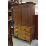 Early 19th century Mahogany Linen Press, converted to a wardrobe, the two panel doors opening to a