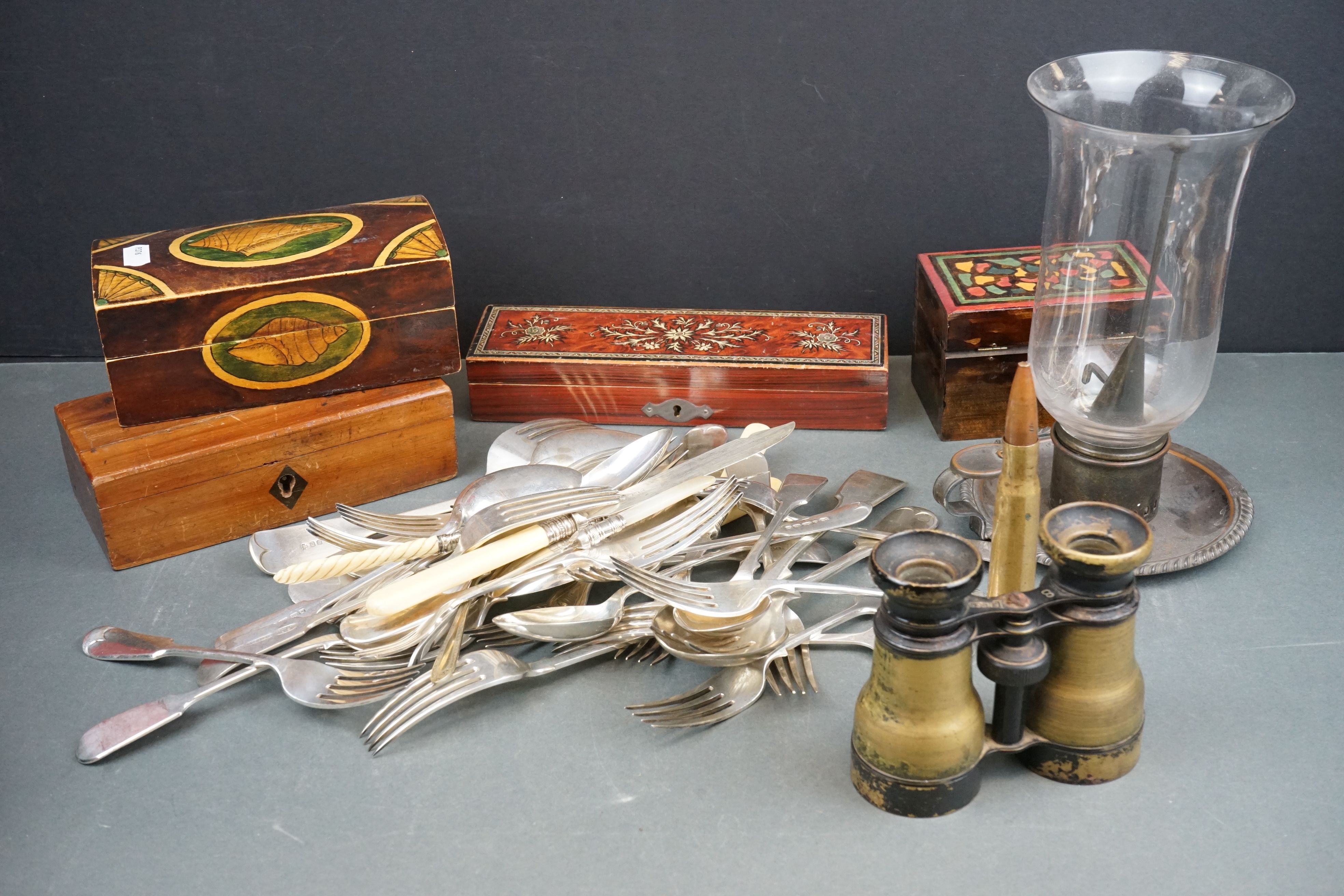 A box of mixed collectables to include silver plated cutlery, binoculars and wooden boxes.