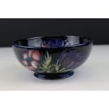 Moorcroft Bowl in the Anemone pattern on a dark blue ground, green impressed marks to base including