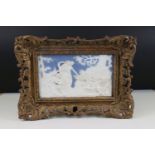Pierced gilt framed Wedgwood plaque depicting classical ladies and putti in a woodland setting