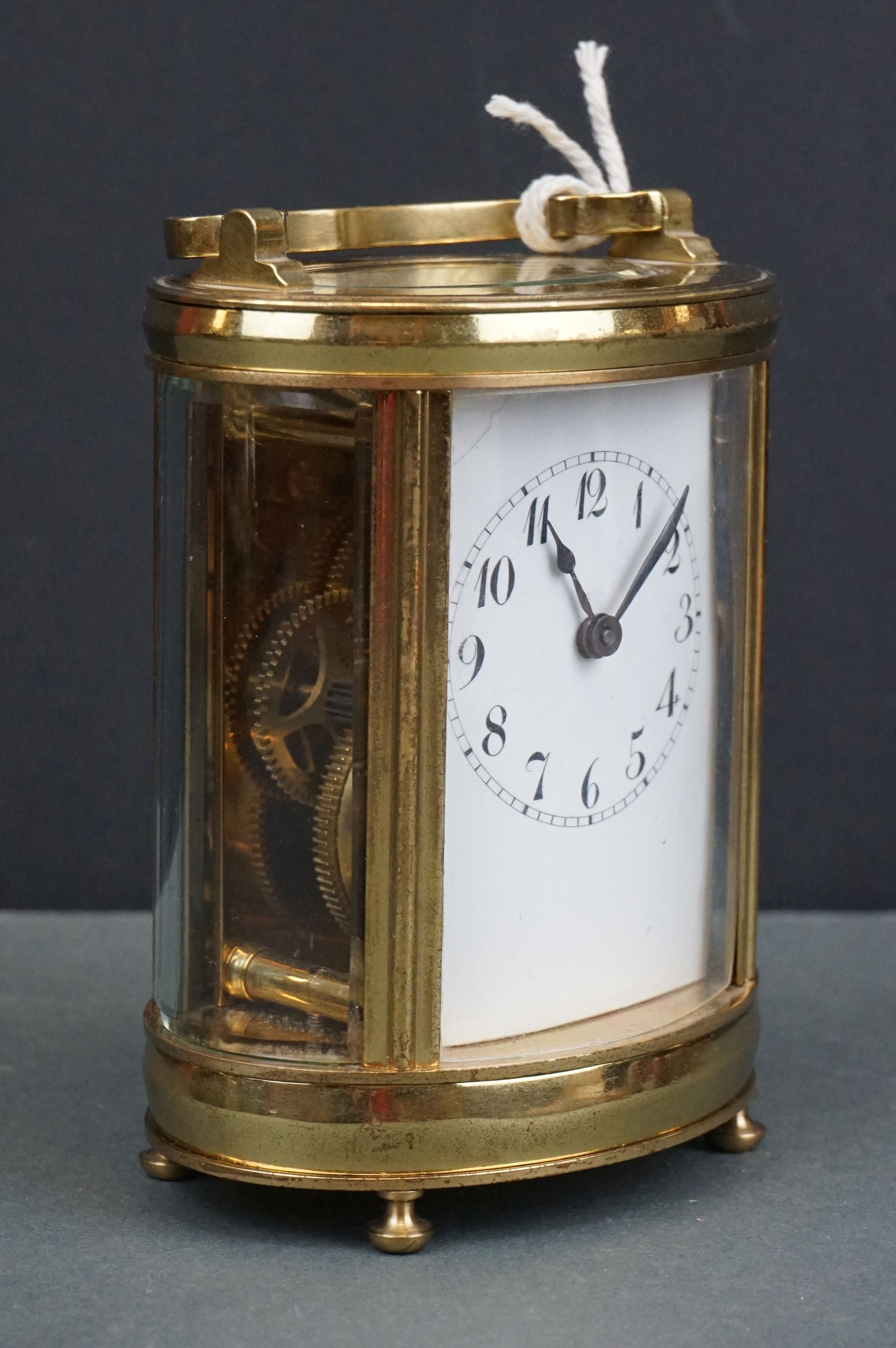 An antique brass cased carriage clock with white enamel dial, complete with key. - Image 2 of 9
