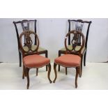 Pair of Victorian Walnut Dining Chairs with ornately carved oval backs together with a Pair of