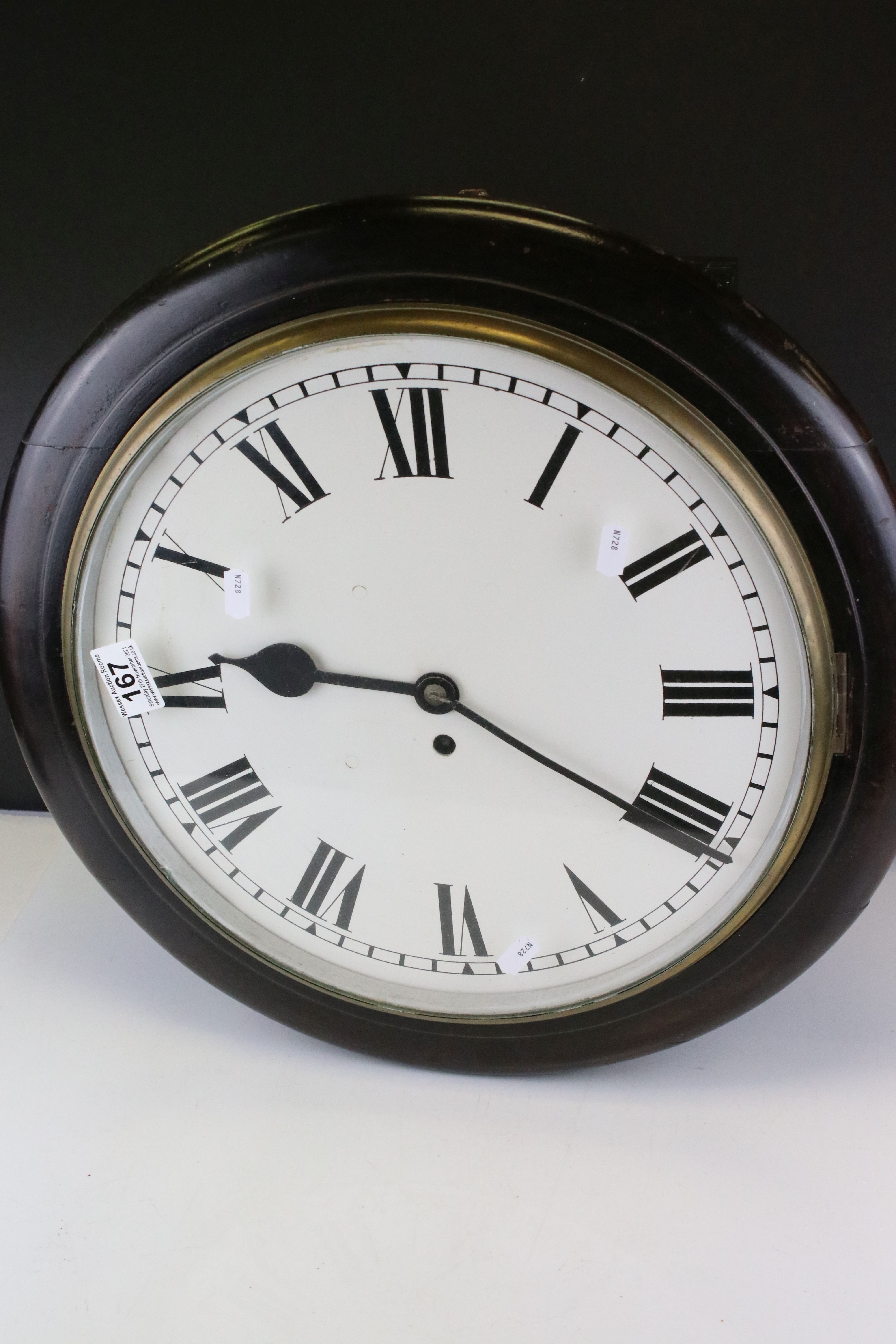 19th century Mahogany Circular Hanging Wall Clock, the white face with Roman numerals and single