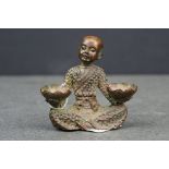 Bronze seated Buddha in the lotus position