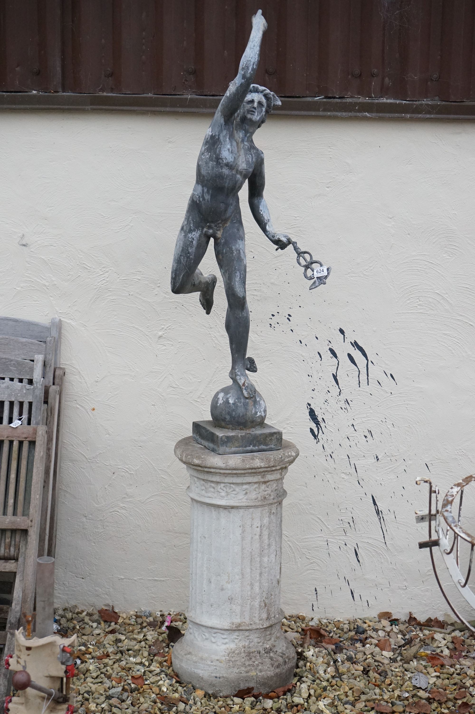 An lead outdoor statue of Hermes mounted to stone corinthian column base, Hermes stands approx 112cm