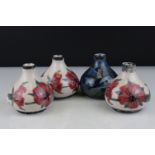 Three Cobridge Stoneware Onion shaped Vases in the Corncockle pattern, 9.5cms high together with a
