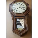 An Arizona clock company wooden cased regulator wall clock.