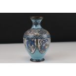 Japanese Cloisonne Vase decorated with panels of dragons on a pale blue ground, 16cms high