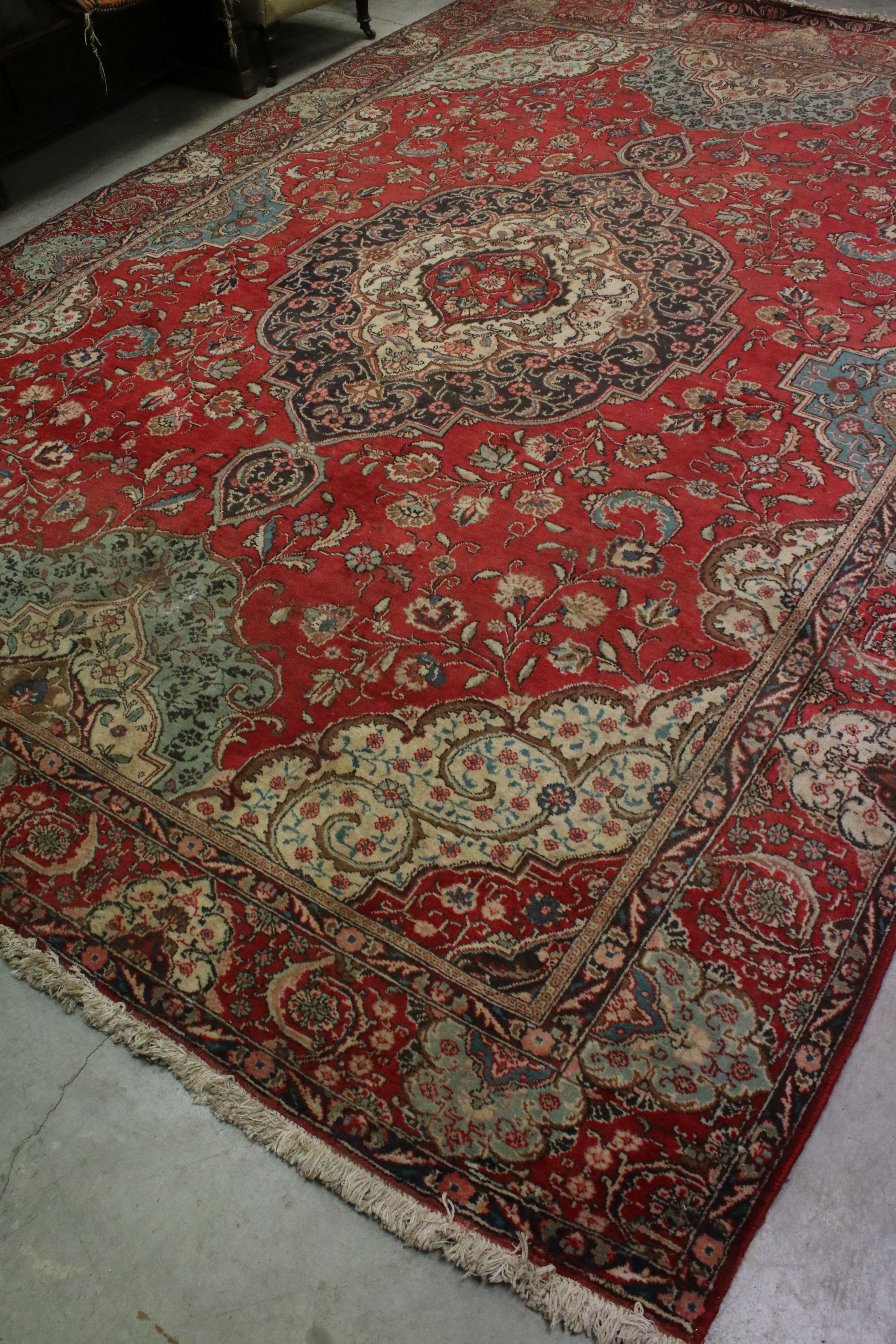 Large Wool Red Ground Rug with floral pattern within a border, 279cms x 396cms - Image 8 of 10