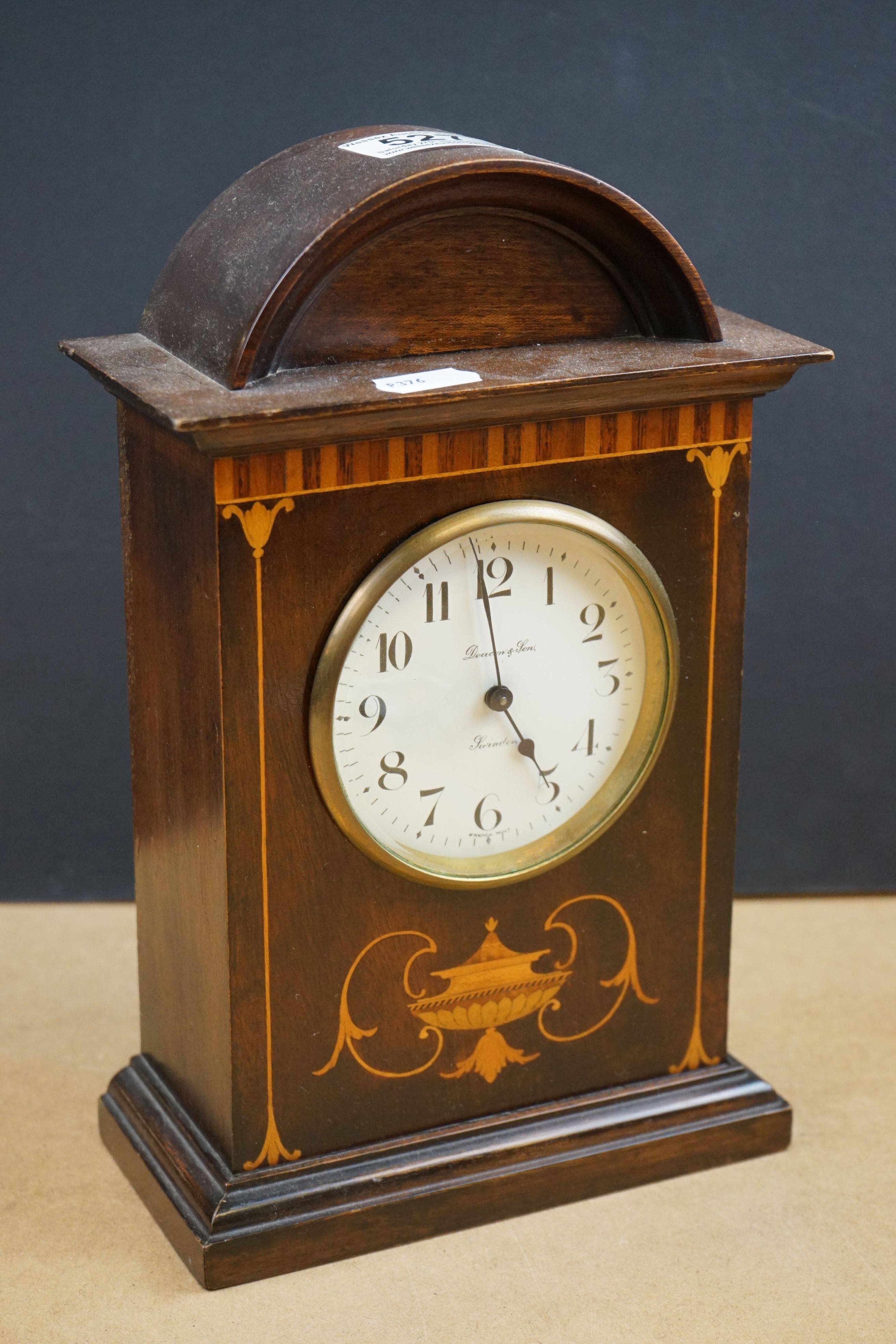 Two wooden cased mantle clocks to include a chiming example, both marked by Swindon retailers. - Image 2 of 8