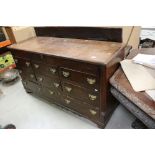 18th century Oak and Mahogany Crossbanded Mule Chest, the hinged lid to top above three faux drawers