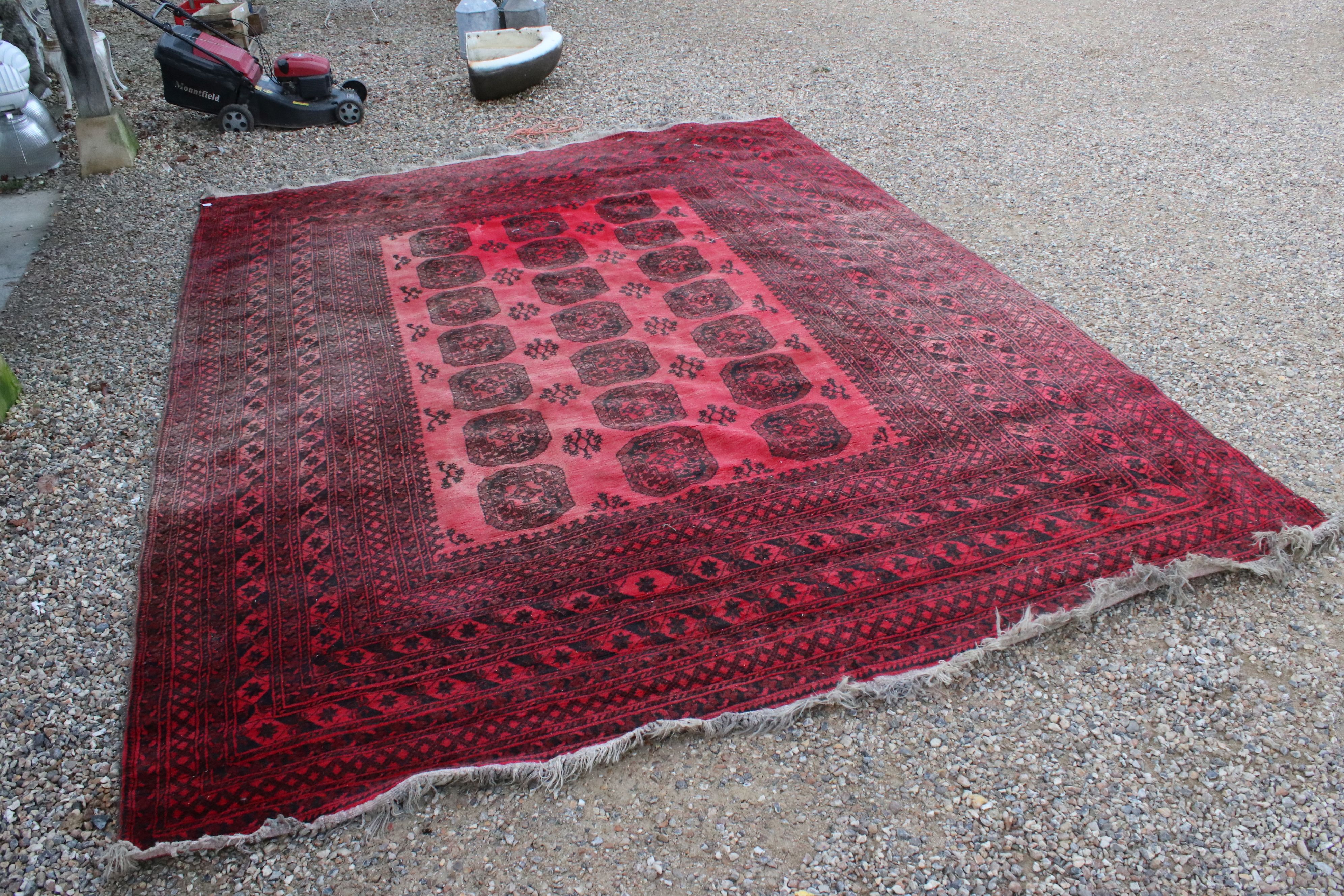 Large Wool Red Ground Rug with geometric pattern within a wide border, 417cms x 313cms - Image 2 of 10