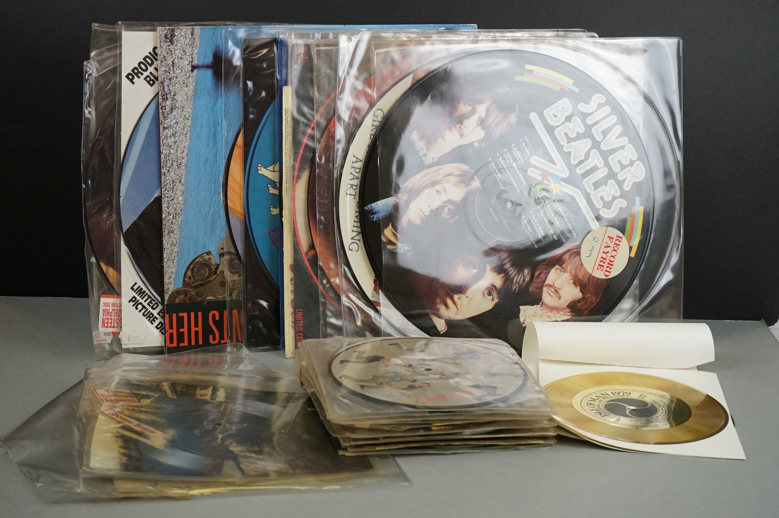 Vinyl - Approx 30 picture & shaped discs picture & shaped discs including Rolling Stones, Madness,