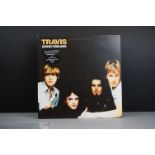 Vinyl - Travis Good Feeling LP on Independiente ISOM 1LP, with black cover, sticker to cover,