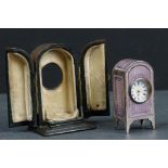 A French hallmarked silver and lilac guilloche enamel miniature clock in original display case.