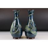 Pair of Longpark Art Pottery vases with dragon decoration to underside, approx. 25cm tall (a/f)