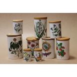 Nine Portmeirion Storage Jars with Wooden Lids, Botanic Garden pattern, tallest 20cms high