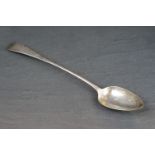 A fully hallmarked sterling silver basting / gravy spoon, assay marked for London and dated 1802.