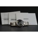 A Seiko Flightmaster 7T34 Chronograph watch with date hand, alarm and timer, complete with