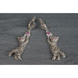 Pair of silver and marcasite leopard style earrings with ruby cabochons