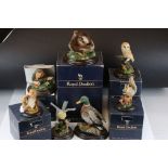 Collection of Seven Royal Doulton and Country Artists Animal and Bird Sculptures, with five boxes