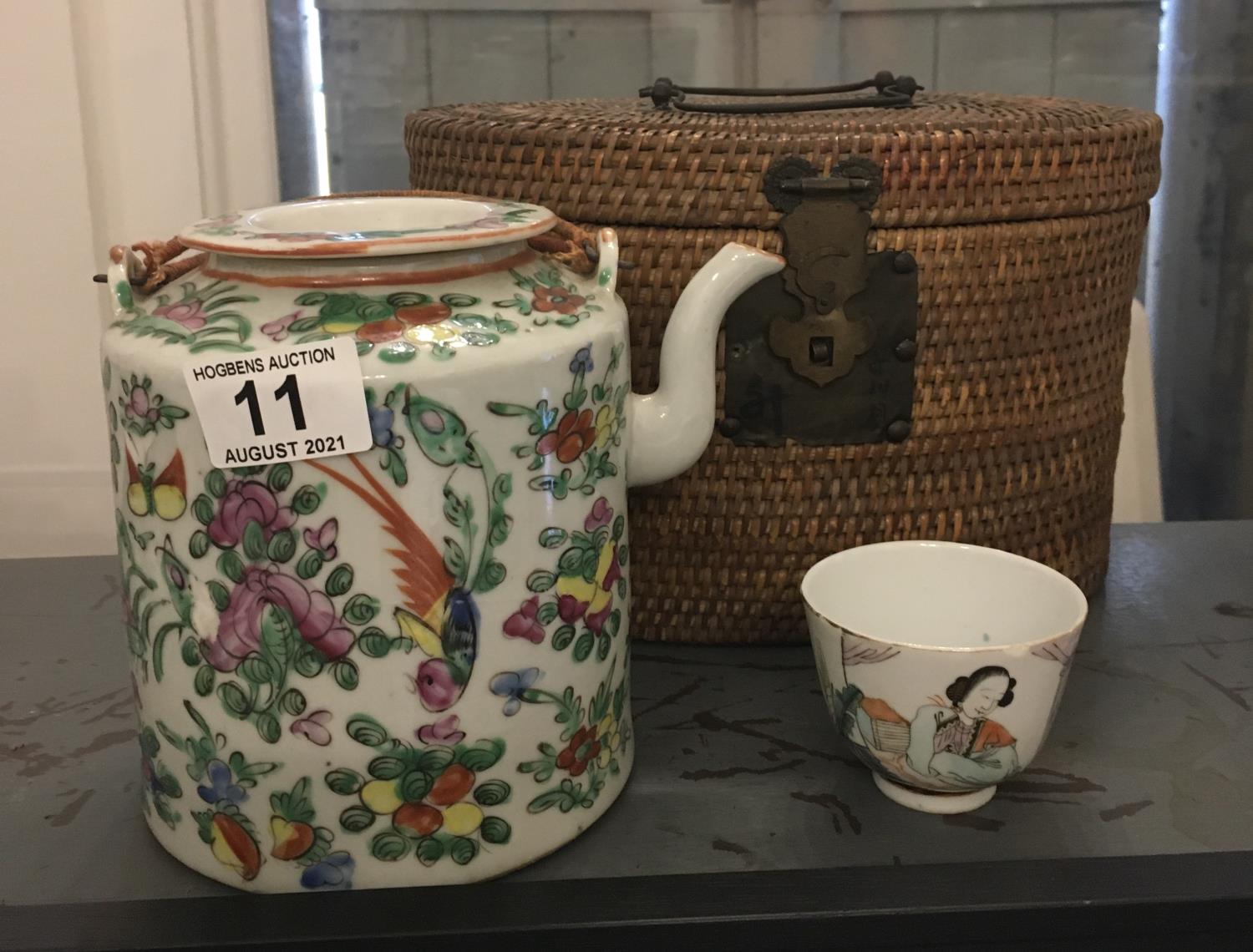 19 th century Famille Rose tea pot and lid, in rattan carrying case, with a single 19 th century