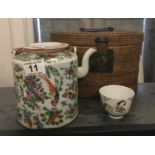 19 th century Famille Rose tea pot and lid, in rattan carrying case, with a single 19 th century