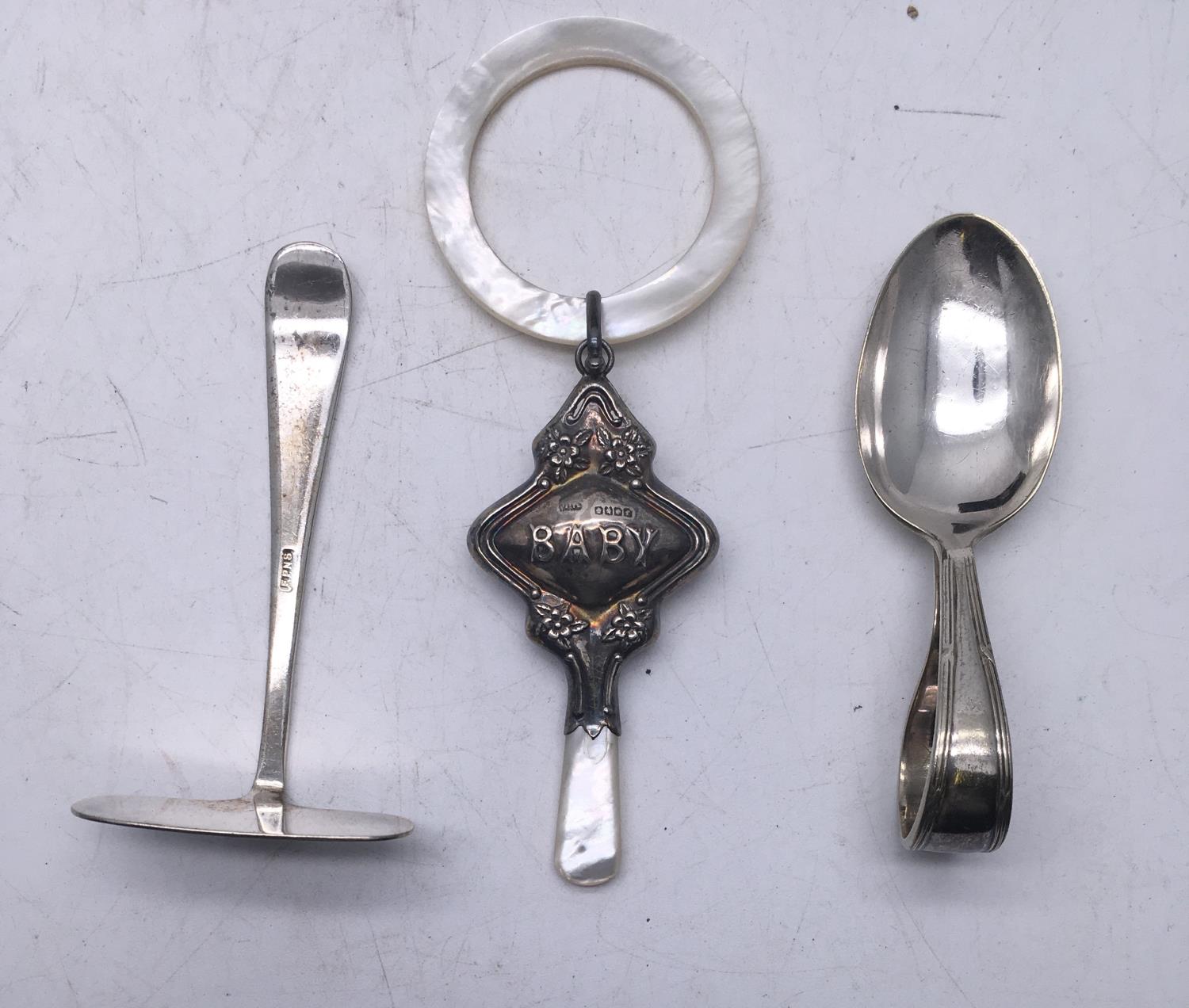 Silver babies rattle with Mother of Pearl handle and bite area and a silver Hallmarked babies