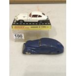 Dinky E-Type Jaguar, 2 + 2 white, with original packaging and a mechanical push along wind up tin