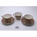 3 x hand painted and signed cabinet cups by Royal Worcester and 2 x matching saucers rose decoration