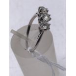 Laides triple Diamond ring size N, total diamond content about 1ct diamonds in good condition claw
