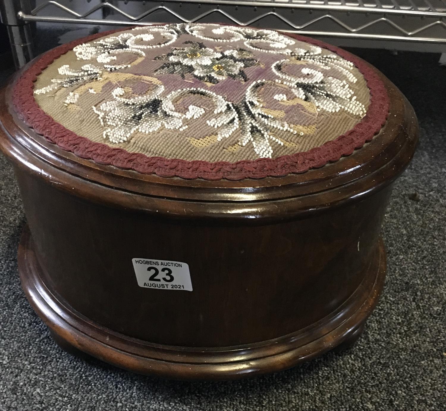 19 th century beaded topped foot stool 13" dia 5" tall with bead work top