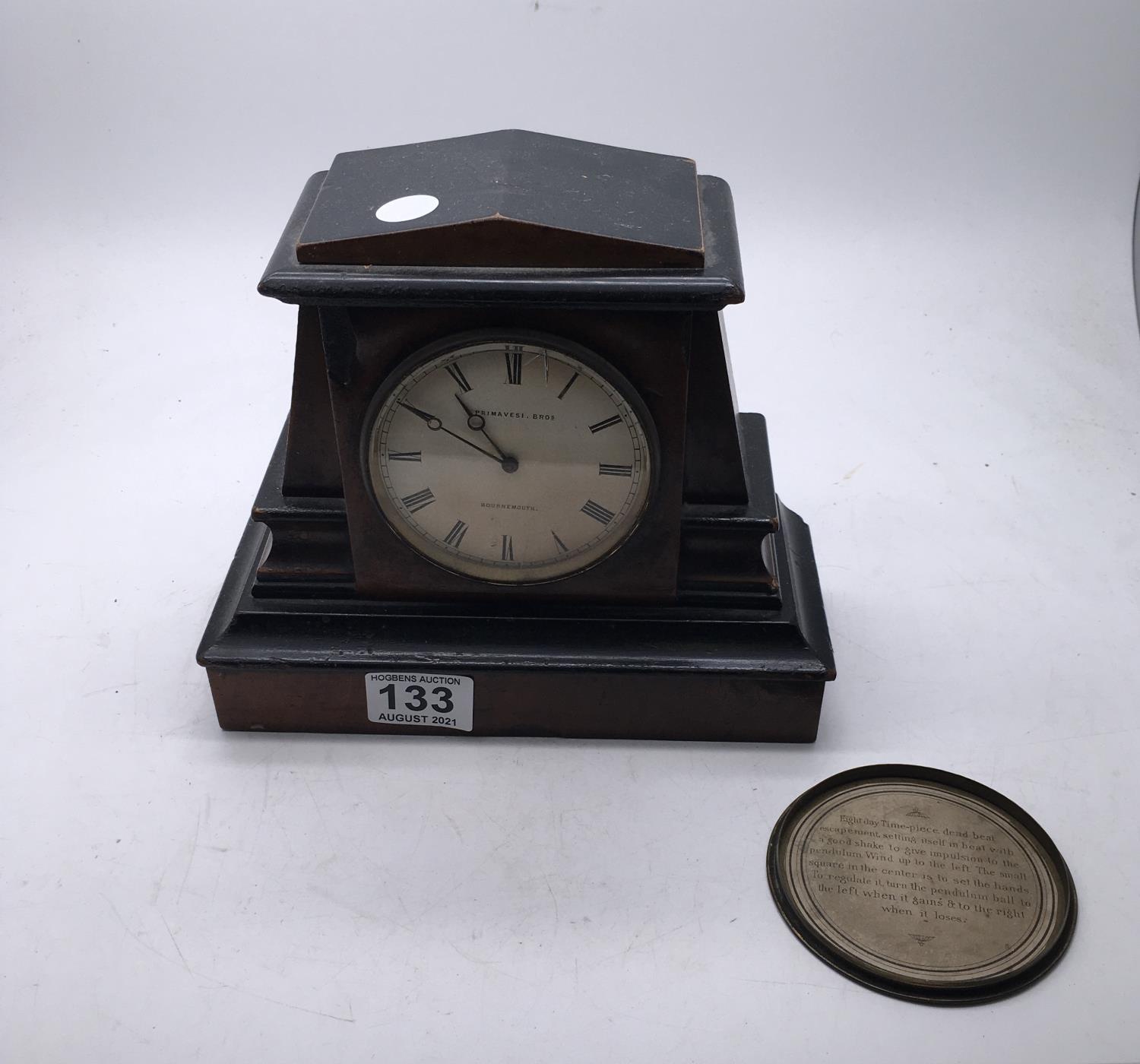 Ebonised and walnut Architectural design mantle clock makers from Bournemouth, dead beat escapement,