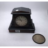Ebonised and walnut Architectural design mantle clock makers from Bournemouth, dead beat escapement,