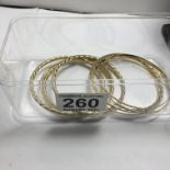 8 assorted gold bangles 9ct 15 grams