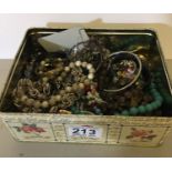 Tin containing various bead costume jewellery, brooches and watches 10