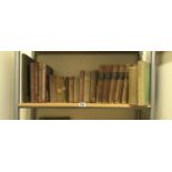 Shelf of hard backed books including first editions,