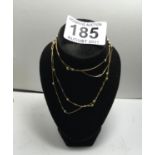 Delicate and charming ladies 18ct gold designer double necklace 4.8 grams the longest chain 17"