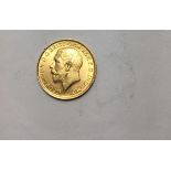 George V full gold sovereign, in good condition