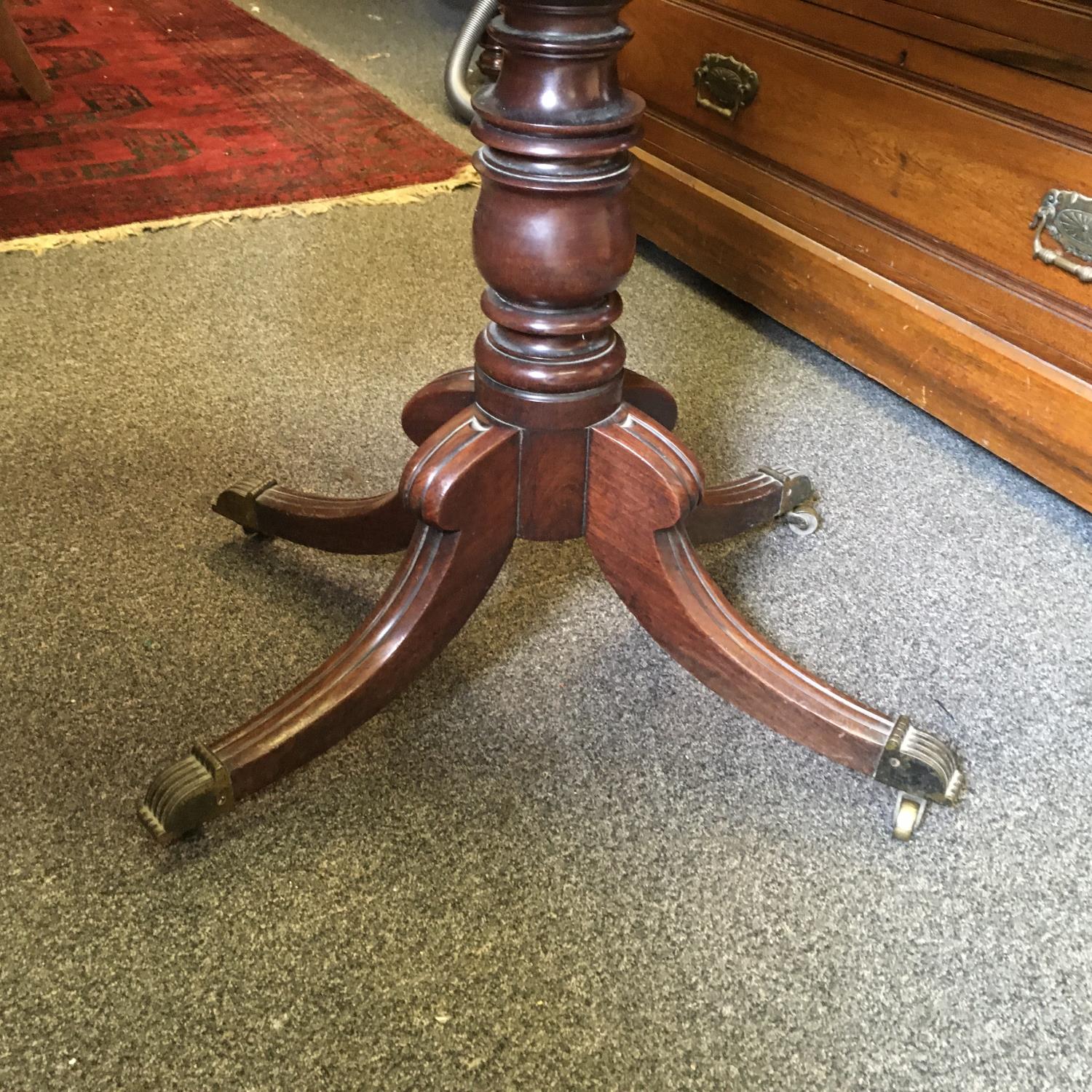 Regency period mahogany tea table with swivel action top revealing storage area below on 4 down - Image 3 of 3