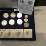 6 x 1oz silver coins, 1 x silver pound, 1 x silver half dollar, in collectors capsules, some with