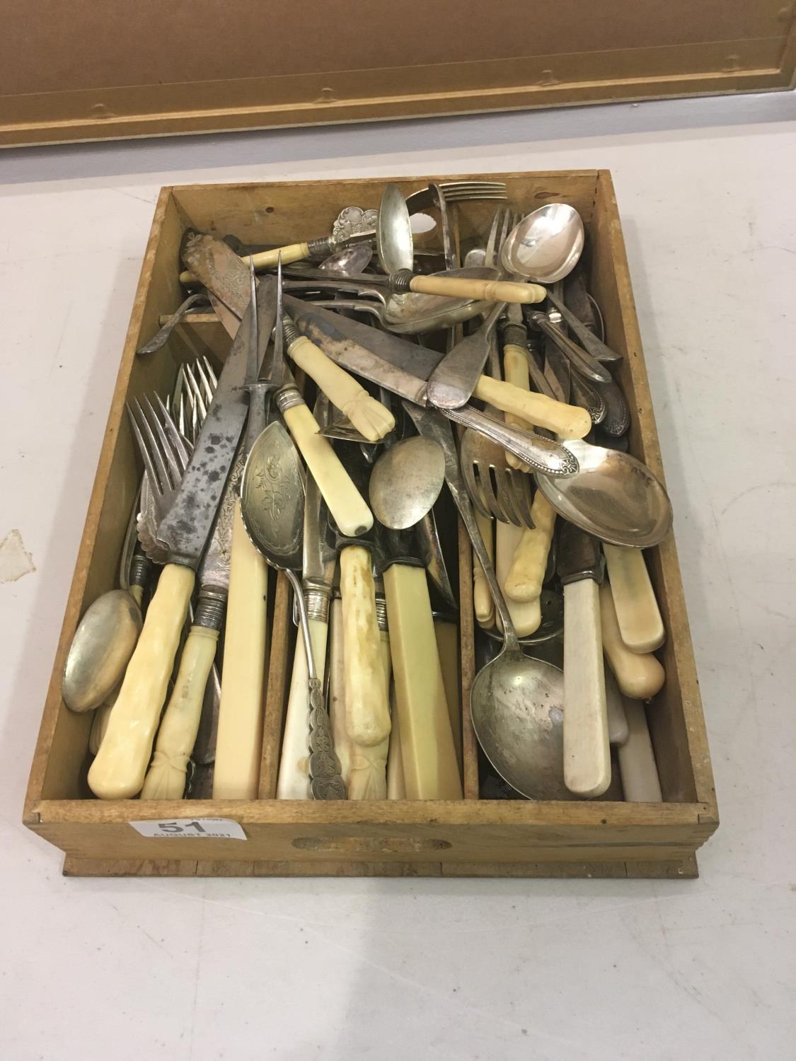 Cutlery box containing some silver handled flatware and a large amount of other silver plated flat