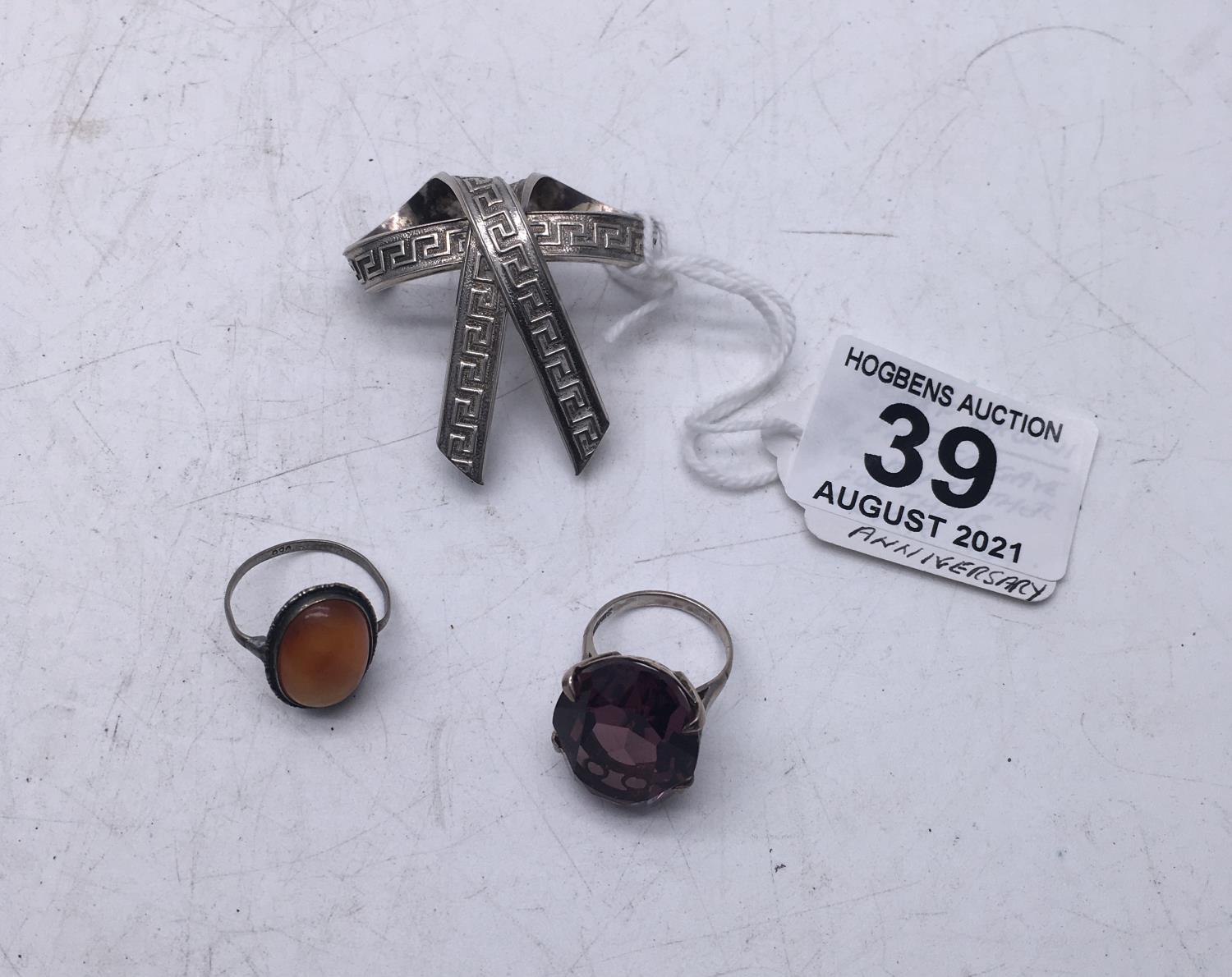 Silver decorative scarf brooch, silver ring set with amethyst and a silver ring set with amber