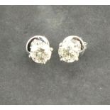 A pair of diamond ear studs, the brilliant cut stones, approx. 1.57ct, claw set in 18ct white
