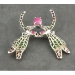 A plique-de-jour brooch, modelled as two dragon fly, set with rubies and marcasite, 8.5gms