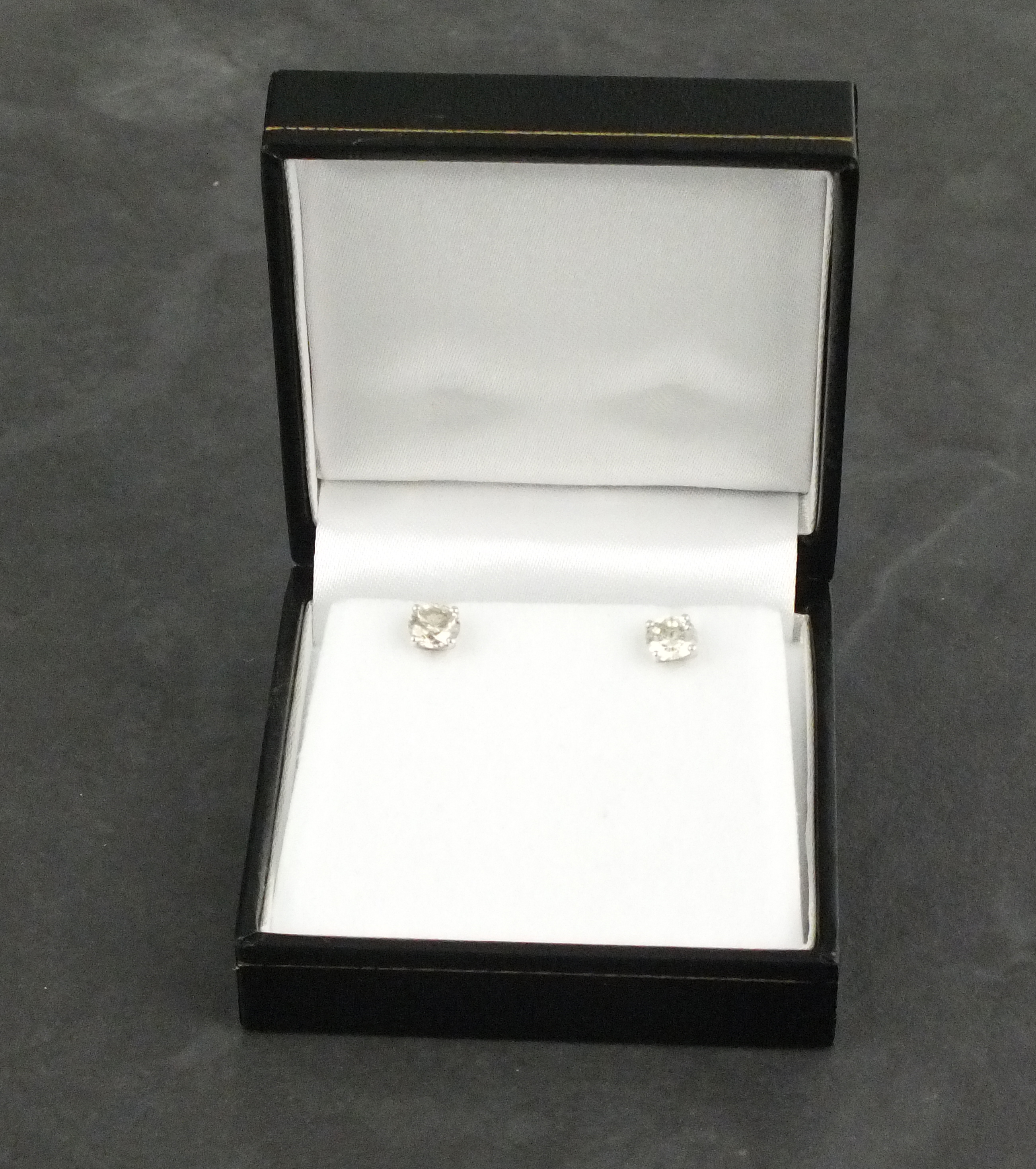 A pair of diamond ear studs, the brilliant cut stones, approx. 1.57ct, claw set in 18ct white - Image 2 of 2