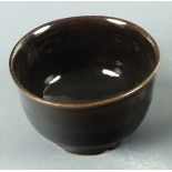 A Boscaen Pottery Bowl, brown glazed with a slightly ouverted rim and raised on a foot rim, 5" (
