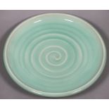 St Just Pottery dish celadon glazed, of shallow dished form with spiral to centre, impressed