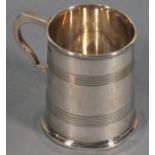 A silver christening mug, Sheffield 1907, Henry Atkin, of tapering cylindrical form, base