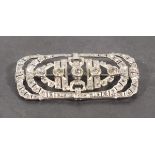 An Edwardian diamond set brooch, of rectangular form set with old-cut stones, the arrangement of